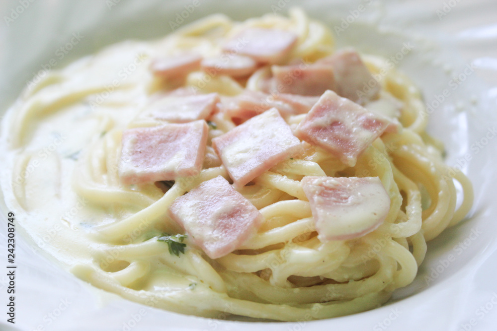 Spaghetti carbonara and becon.It is yummy breakfast.Pasta and cream is soft. Spaghetti carbonara and becon.It is yummy breakfast.Pasta and cream is soft.