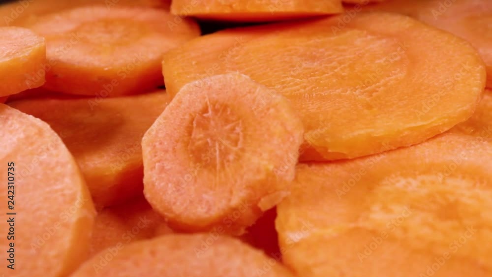 fresh Carrots sliced rotates, closeup, concept of healthy food, vegetarianism fresh Carrots sliced rotates, closeup, concept of healthy food, vegetarianism