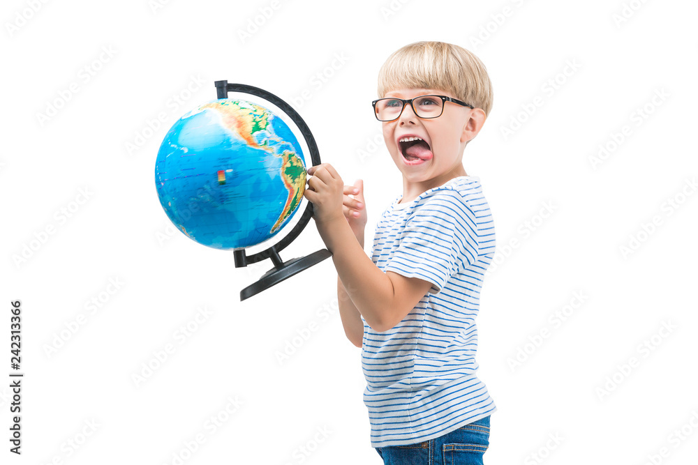 Fototapeta premium Cute little child isolated on white background holding globe. Schoolboy study geography. Cute boy travel. Family vacation with children