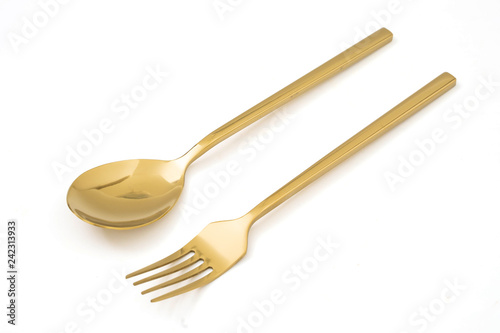 golden spoon and fork isolated