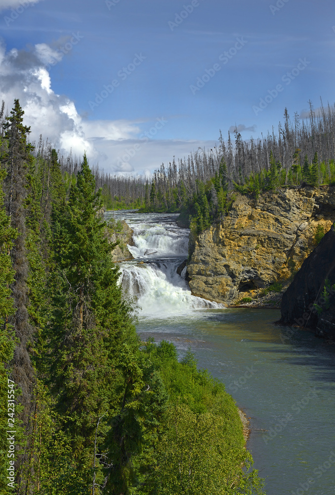 Fototapeta premium Smith River Falls - Fort Halkett Provincial Park of British Columbia on the Alaska Highway, Northern Rockies, Canada