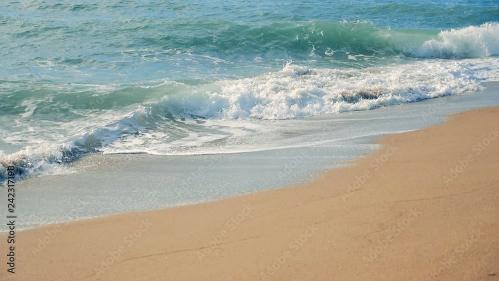 Seashore and turquoise sea waves. Slow motion. Seashore and turquoise sea waves. Slow motion.