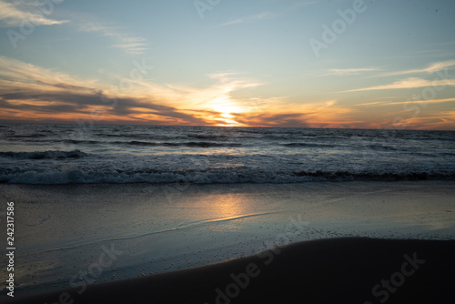 sunset beach sand sea reflection