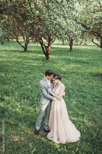 wedding couple in love hugging outdoors