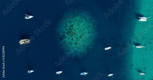  boat in a lagoon in aerial view, Papeete French Polynesia