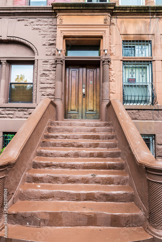 Old typical houses in Harlem  in New York City  USA