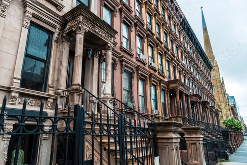 Fényképezés Old typical houses in Harlem, in New York City, USA