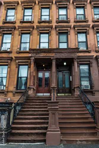Old typical houses in Harlem, in New York City, USA