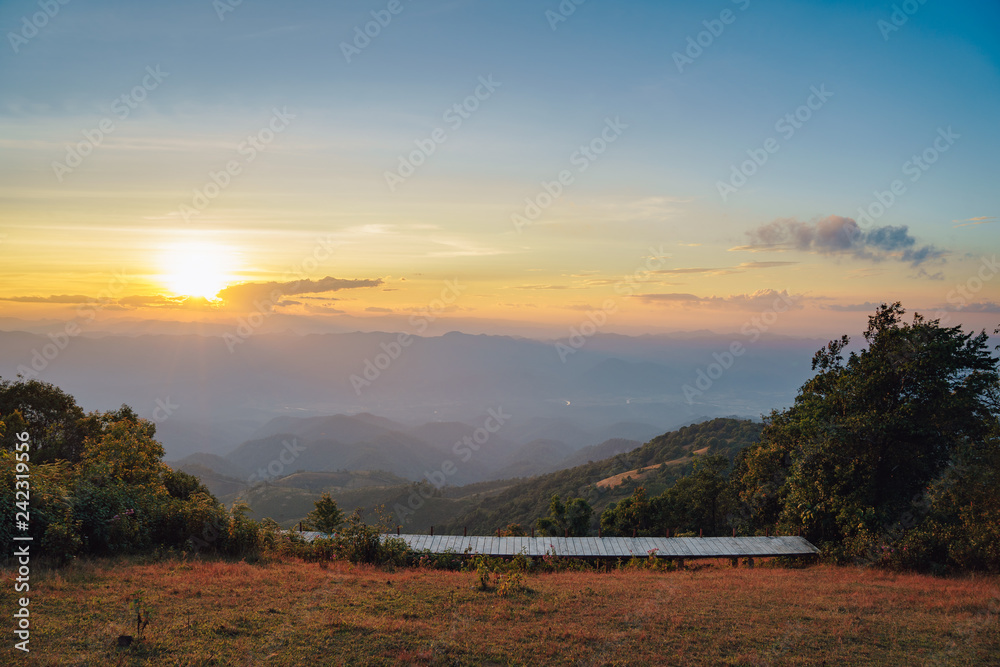 Sunset on the mountain with brown hay. Location: Pui Kho mountain in Northern Thailand