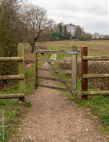 Small gate on path in rural countryside