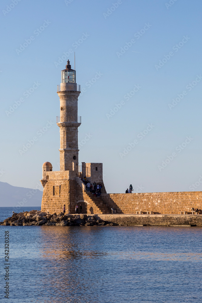 Chania Crete, 12-15-2018. Old light house at Chania harbor in  Crete  Greece