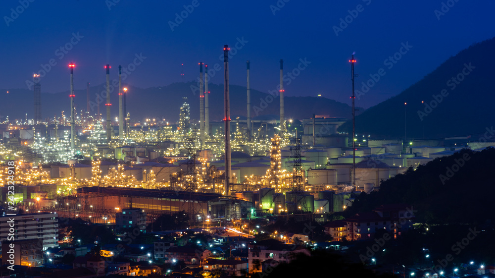Industrial power plant oil station night landscape. Backgrounds Industrial power plant oil station.