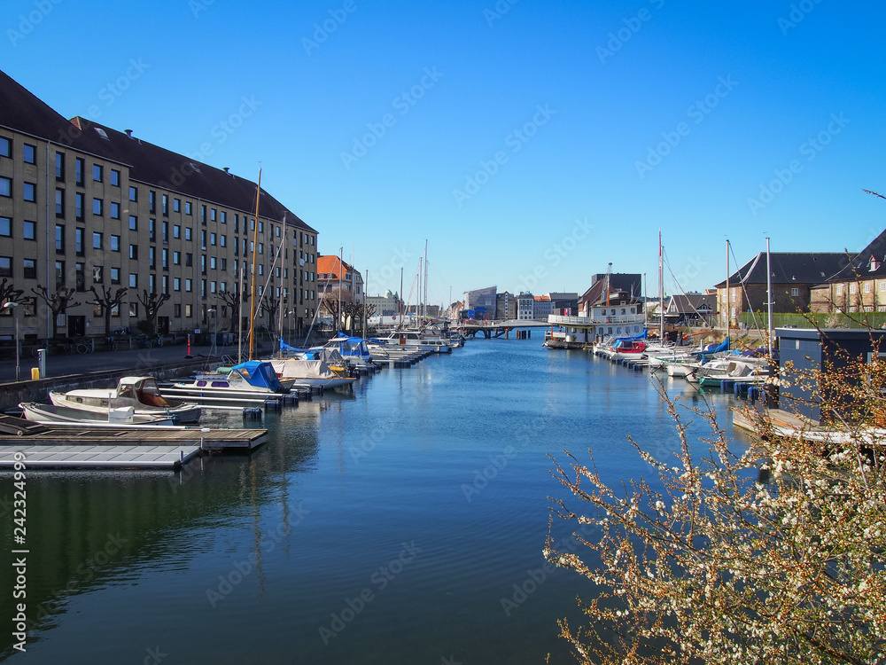 View of the contemporary architecture and water canals of the Christianshavn district in Copenhagen, Denmark