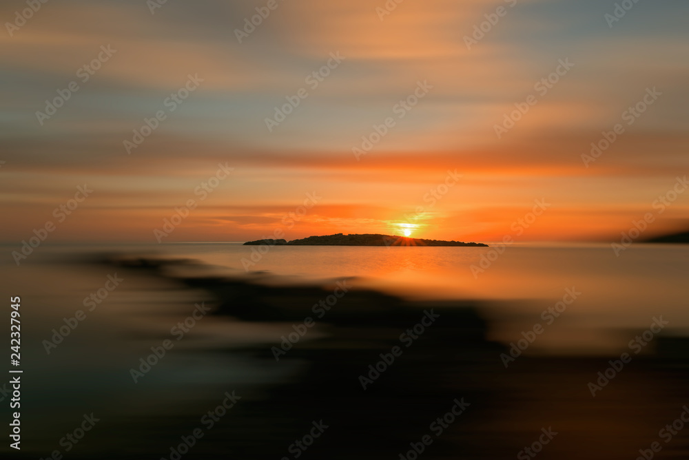 Background of a nice sunrise in Ibiza with effect
