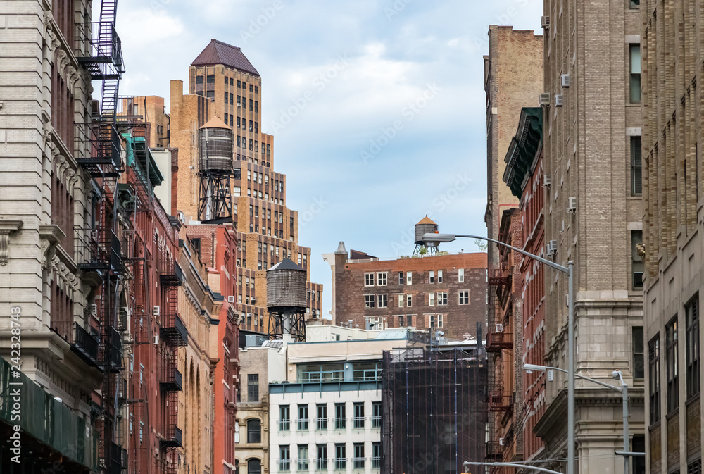 View of the old buildings and water towers in the Tribeca neighborhood of Manhattan, New York City