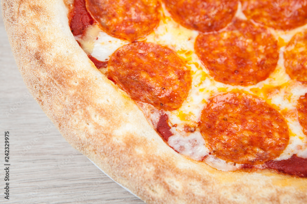 fresh hot pepperoni pizza with sausage