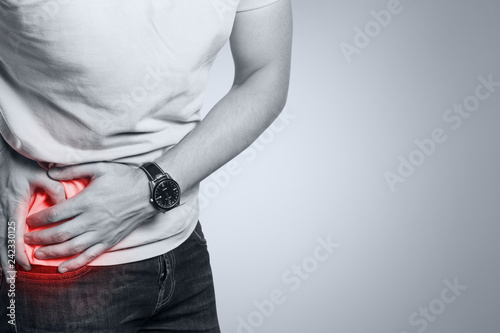 Man suffering from abdominal pain