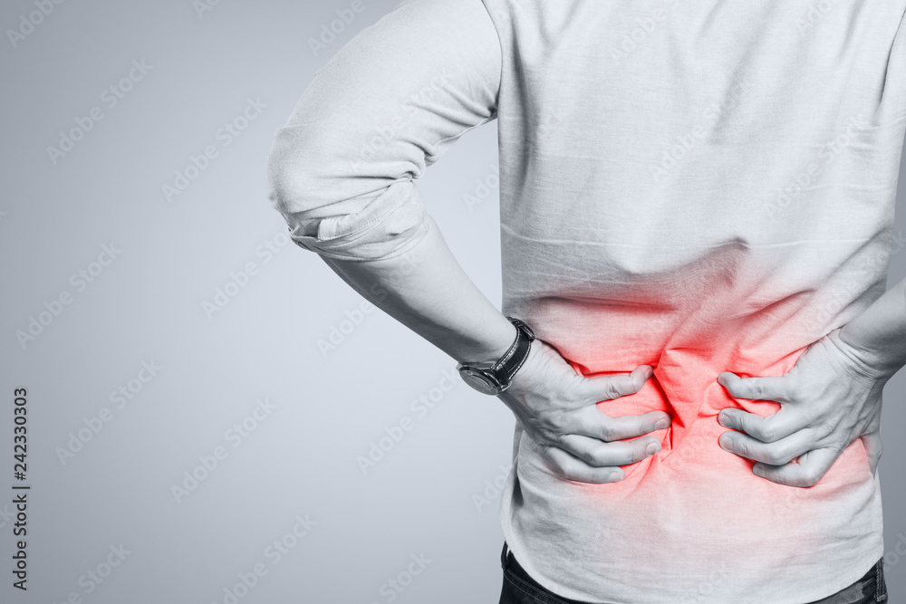 Man suffering from a lower back pain