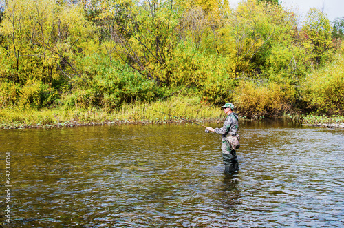 Autumn fishing on a small river