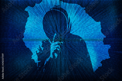 Hacker on a background with binary code