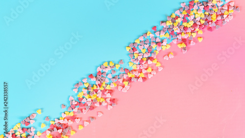 Candy frame  background.  Copy space concept . Flat lay  top view. Candies on pastel turquoise background.