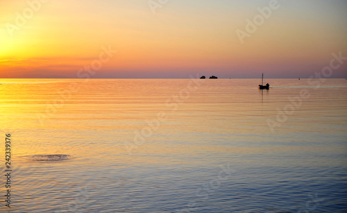 Fototapeta Naklejka Na Ścianę i Meble -  Fisher boat on sunset, Mediterranean sea