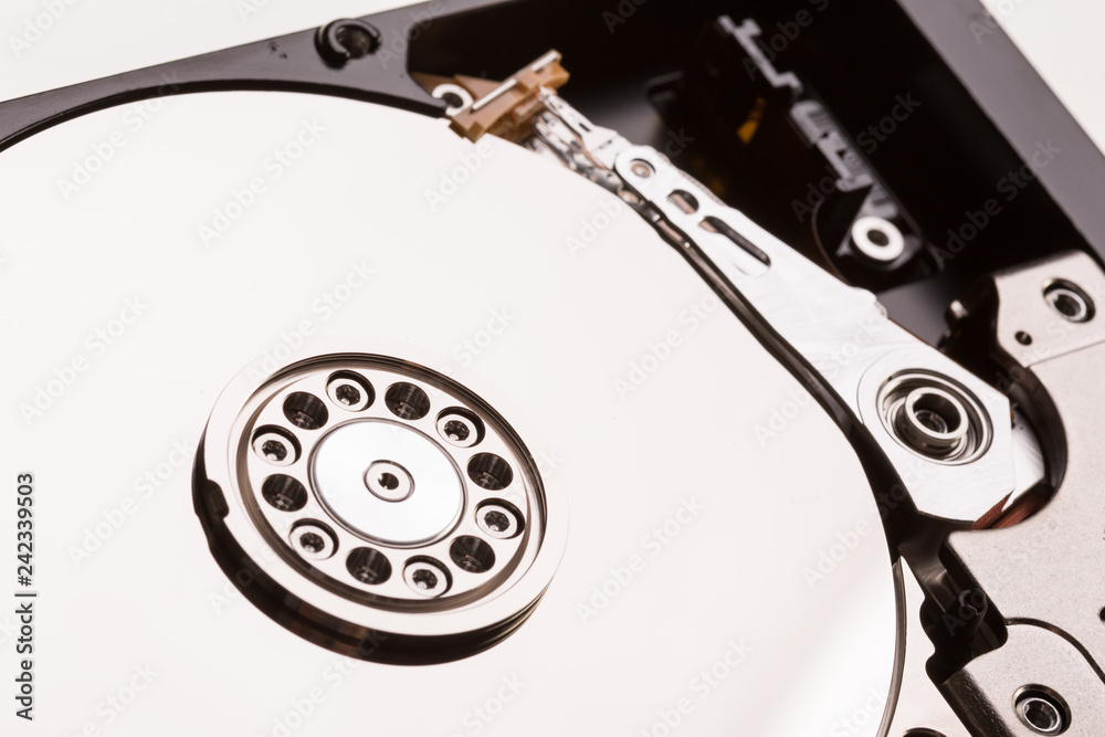 Open computer hard drive disc on white Open computer hard drive disc on white