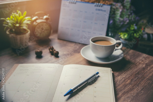 Appointment schedule Concept. Work from Home, Desktop Calendar,  diary place on office desk. Notebook for Planner to planning timetable,  event agenda,  appointment, organization each  month and year