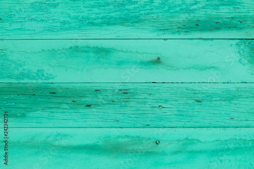 old shabby planks with cracks, green tint, grunge, texture, background 
