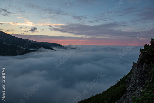 large misty cloud climbing mountain valley in slovakia, Tatra