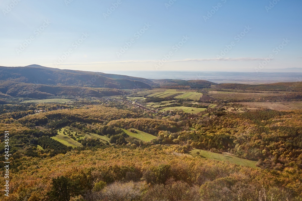 Hilly landscape with small village