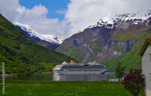 Bild auf Leinwand Modern Costa cruiseship cruise ship liner in Geirangerfjord, Norway on sunny day