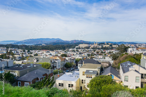 Aerial views of residential areas of San Francisco; Golden Gate and Marin county in the background, California
