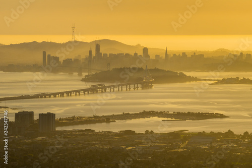 View towards San Francisco and the bay bridge at sunset, California