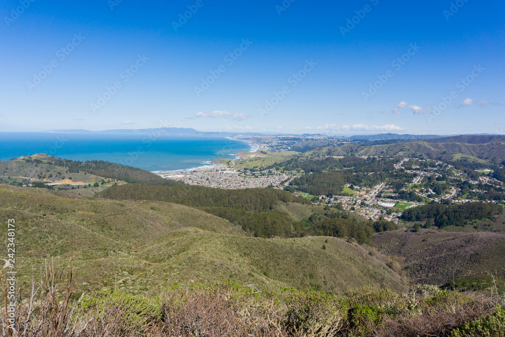 Aerial view of Linda Mar and Pacifica as seen from Montara mountain, San Francisco and Marin County in the background, California
