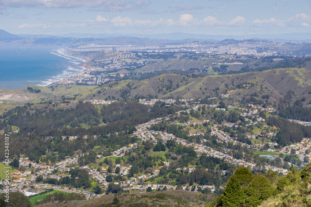 Aerial view of Pacifica and San Pedro Valley as seen from Montara mountain, San Francisco and Marin County in the background, California