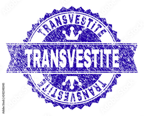 TRANSVESTITE rosette stamp watermark with distress style. Designed with round rosette, ribbon and small crowns. Blue vector rubber watermark of TRANSVESTITE title with retro texture.