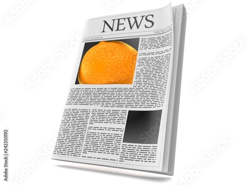 Orange inside newspaper