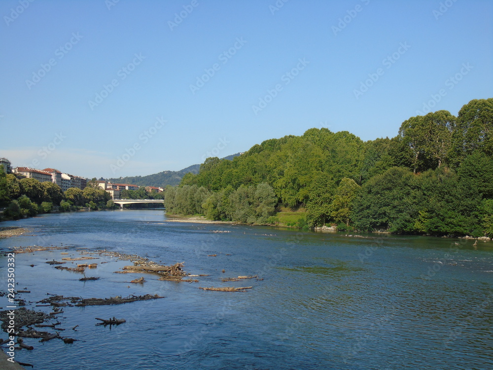 Turin, Italy - 12/01/2018: An amazing photography of the city of Turin from italy in summer days from the high and low part of the city including the beautiful river of Po from the center