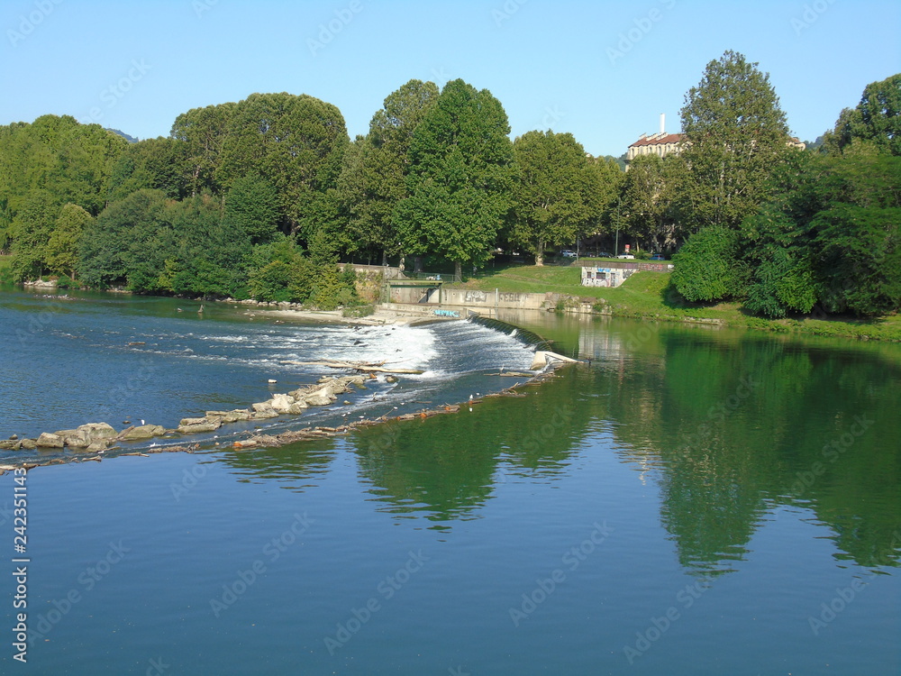 Turin, Italy - 12/01/2018: An amazing photography of the city of Turin from italy in summer days from the high and low part of the city including the beautiful river of Po from the center