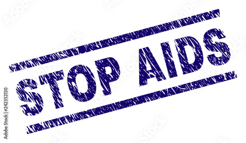 STOP AIDS seal print with distress style. Blue vector rubber print of STOP AIDS caption with retro texture. Text caption is placed between parallel lines.