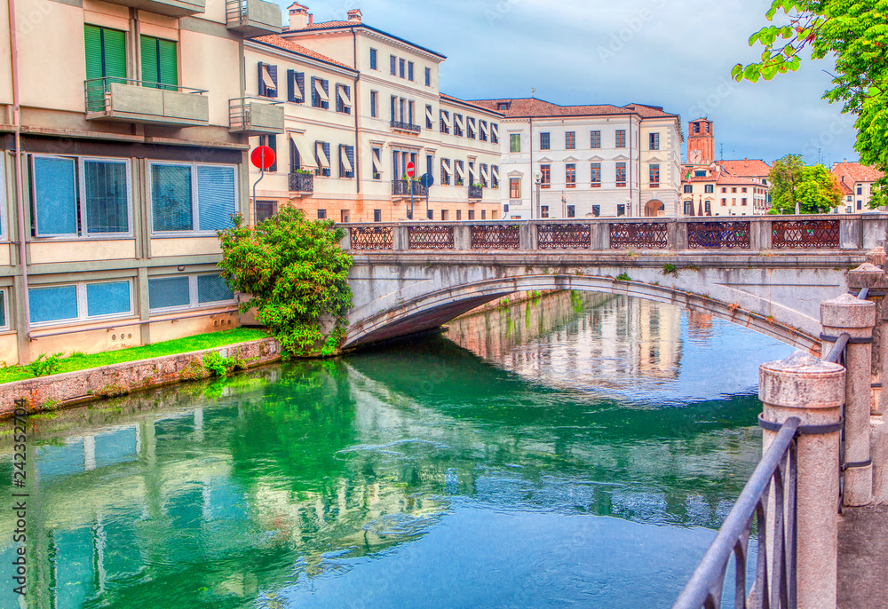 bridge over water canal in Treviso city, Italy