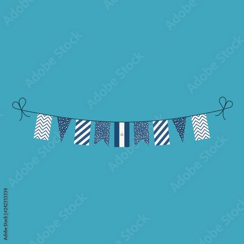 Decorations bunting flags for Nicaragua national day holiday in flat design. Independence day or National day holiday concept.