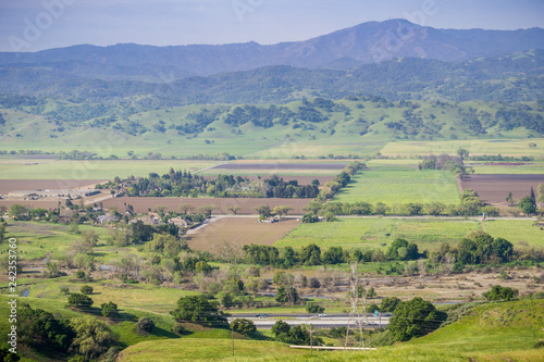 Aerial view of agricultural fields, mountain background, south San Francisco bay, San Jose, California