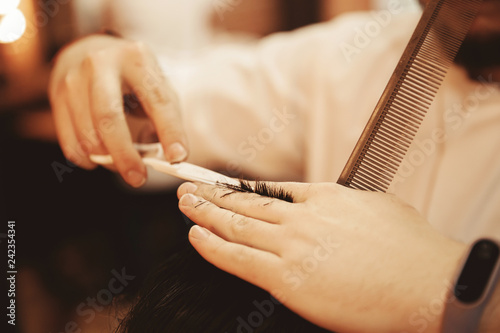 Men hair cutting scissors in beauty salon