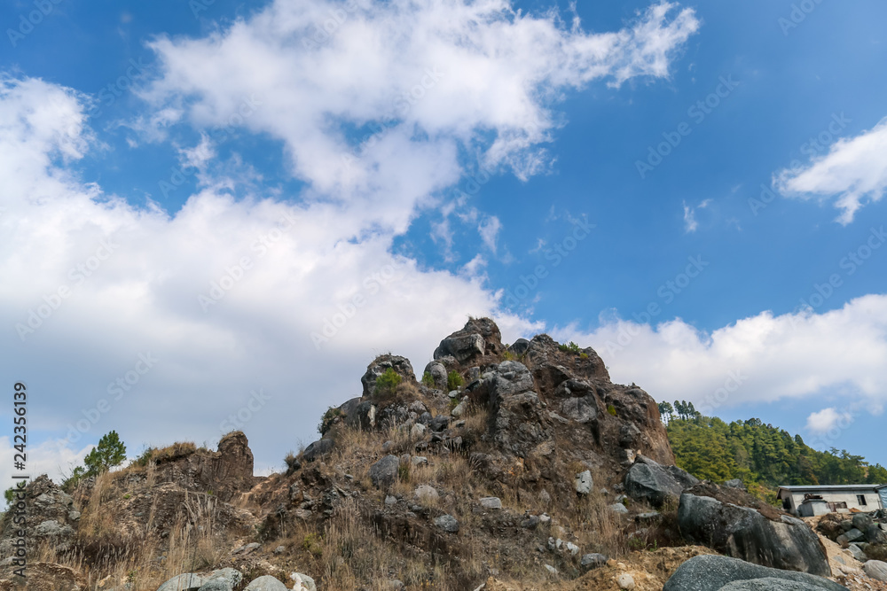 A rock with clear sky background