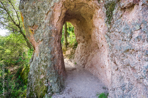 Tunnel carved out in the rock wall, Pinnacles National Park, California