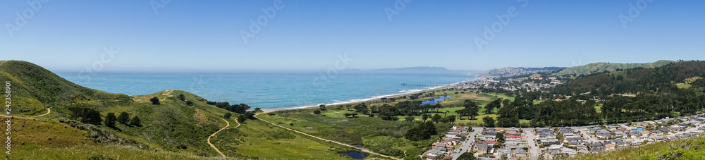 Panoramic view of Pacifica coastline as seen from the top of Mori Point, Marin County in the background, California