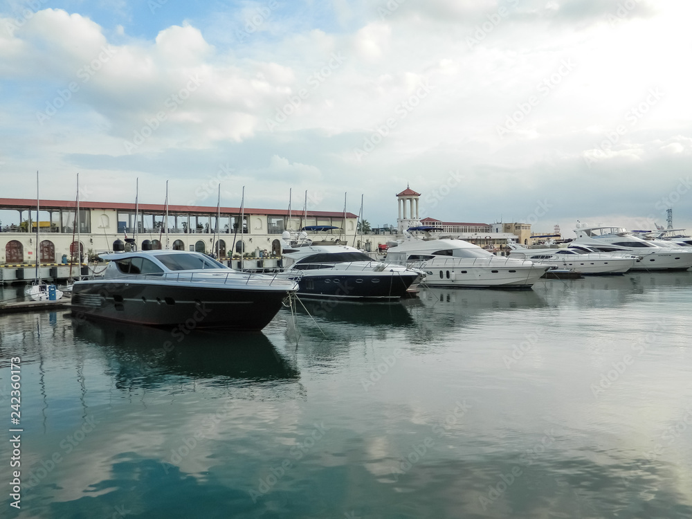 Marine station, parking of yachts and ships.  Navy ships.