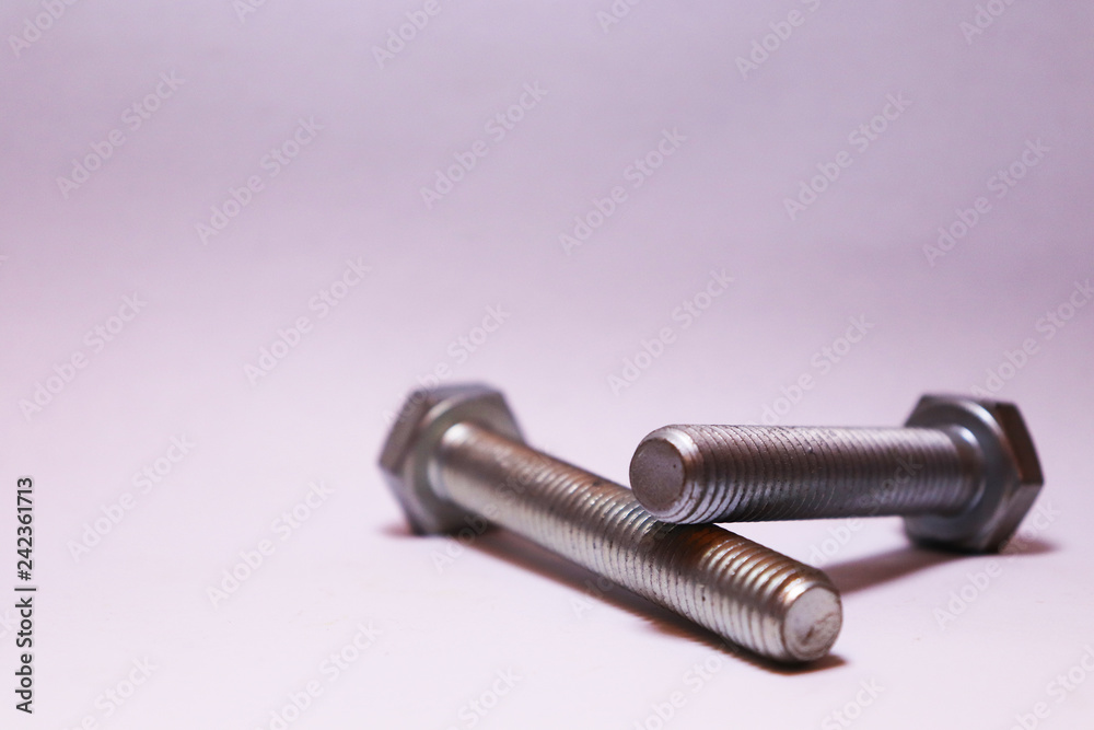 Two big bolts on the side with white background Two big bolts on the side with white background